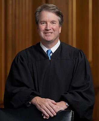 Photo of a man wearing a judicial robe