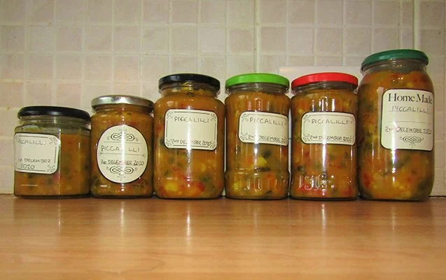 Photo of six jars of homemade mustard piccalilli