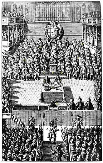 Engraving of the House of Commons chamber filled with men and a hatted man sitting, back to the viewer, in a dock at the center