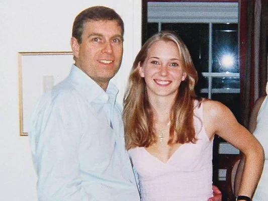 Photo of a man with his arm around a young woman