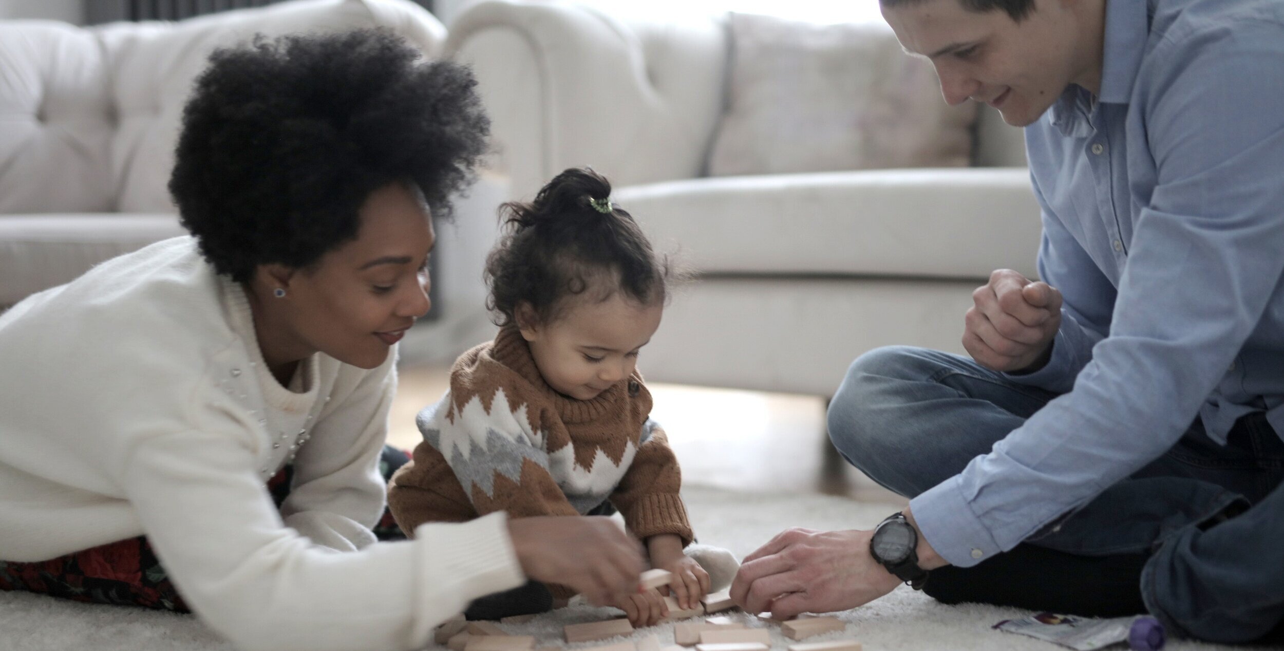 photo-of-man-and-woman-playing-with-their-child-3819567.jpg