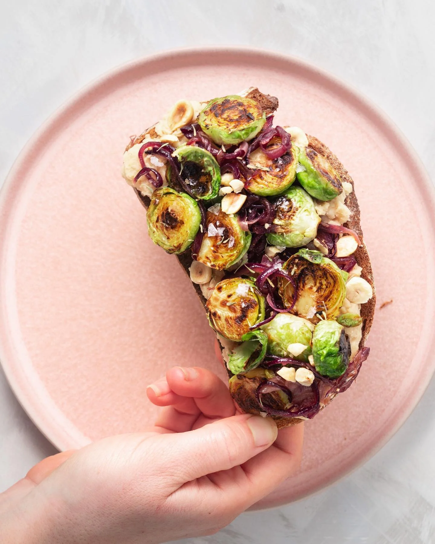 Miso Butterbean P&acirc;t&eacute;, Garlic Brussels Sprouts, Caramelized Onion and Toasted Hazelnuts on Sourdough.☀️❤️
 
You may have noticed I&rsquo;m really into my recipes that look all fancy but are secretly not that difficult to make. This is def