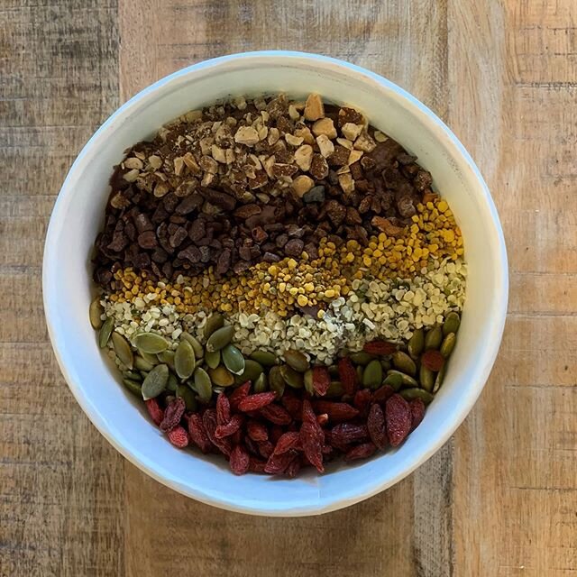 Super Protein Bowl- creamy peanut butter Acai blend topped with almonds, cacao nibs, pepitas, bee pollen, goji berries,hemp seeds, and your choice of fruit! This is the perfect post workout bowl with 23 grams of protein!