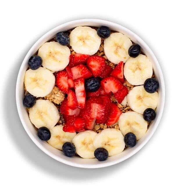 Classic Bowl- Berry acai base topped with honey almond granola, banana, strawberry, and your choice of fruit!