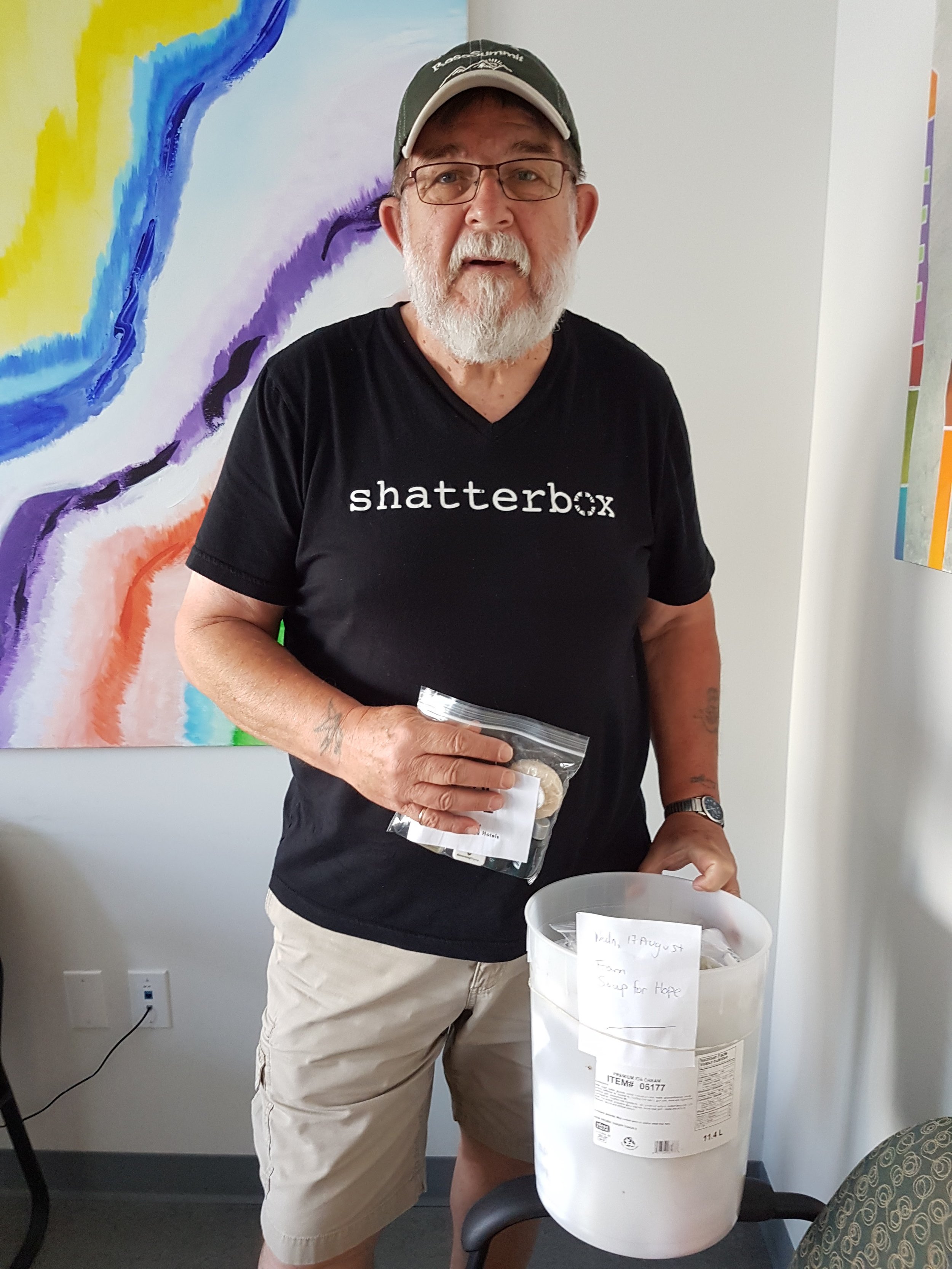 Giving a soap donation.jpg