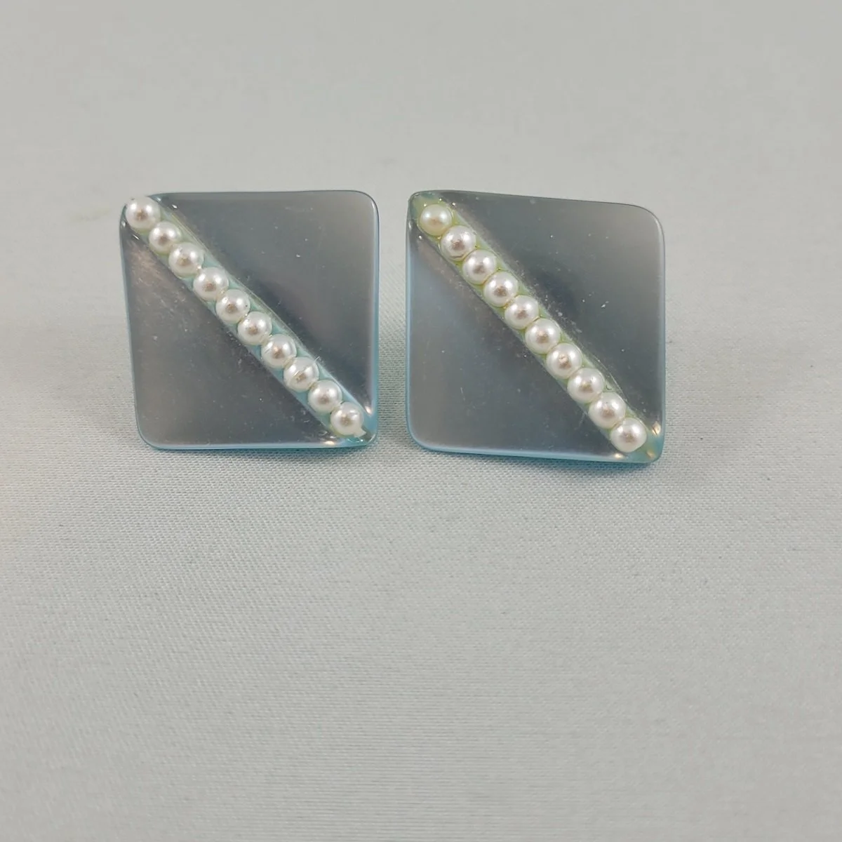 Translucent Baby Blue Moonglow Channel Set Pearls Tapered Square 1 Inch Pierced Earrings.jpg