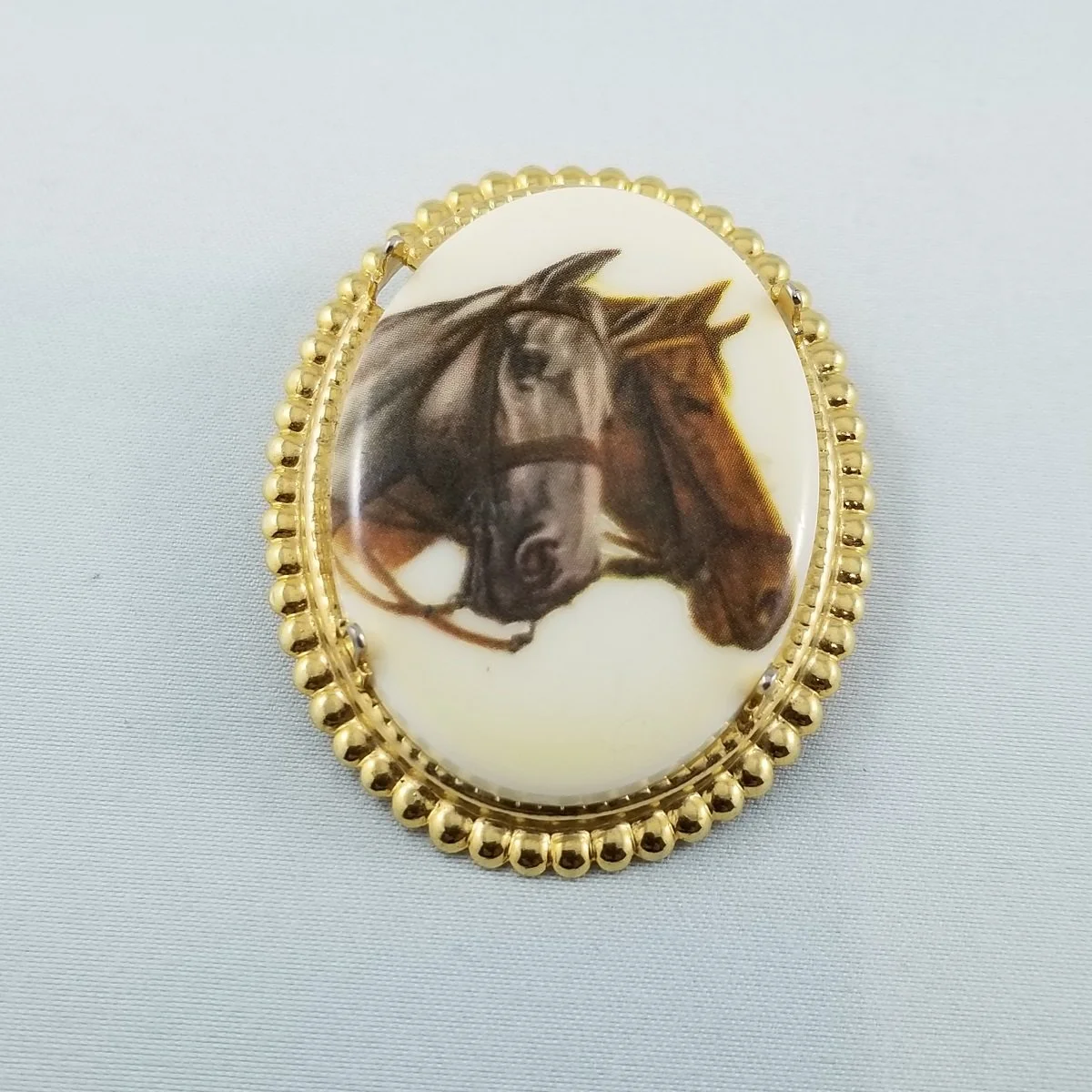 Equestrian Transferware Two Horse Heads Cameo Plastic Oval Gold-tone Setting Brooch