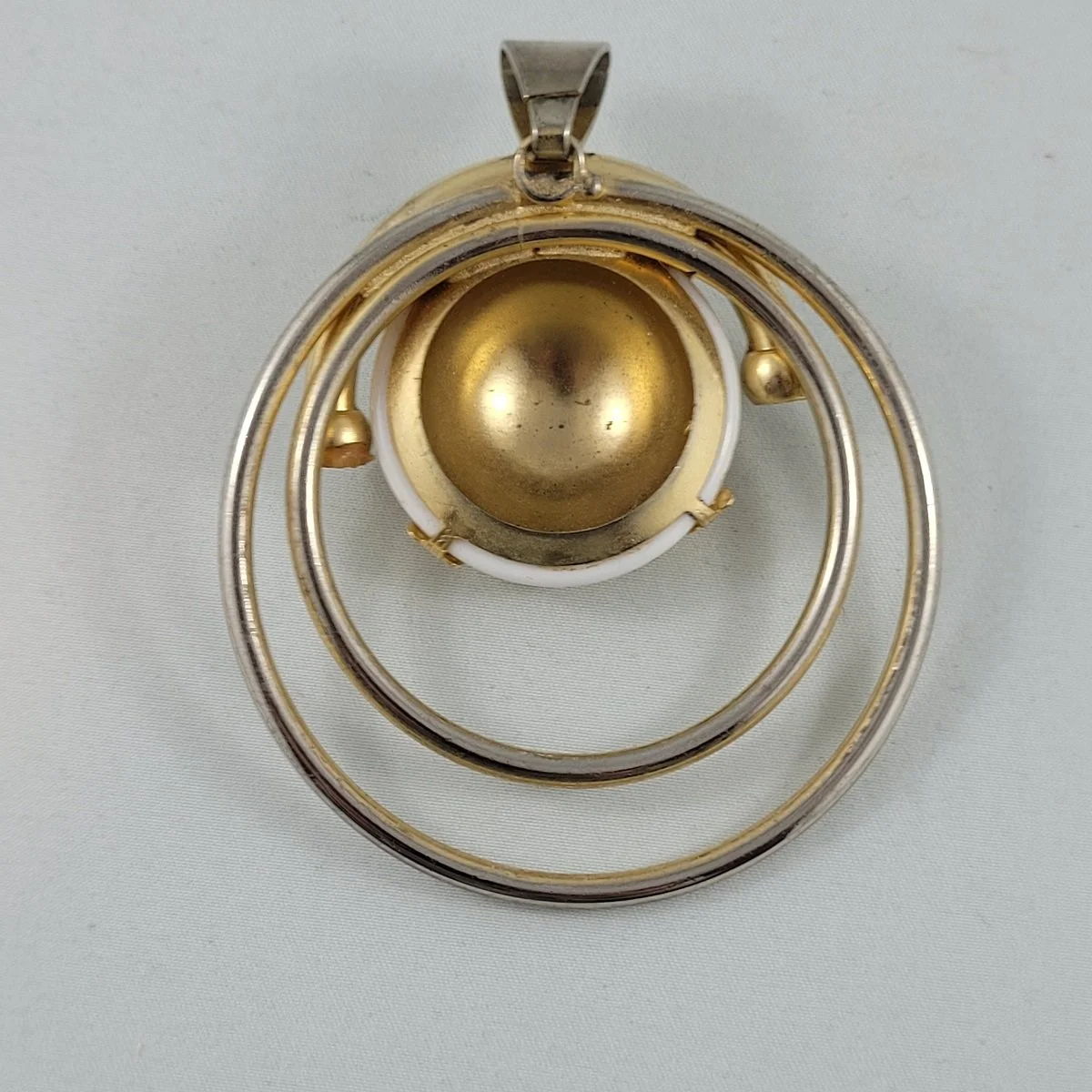 1980's - 1990's Orbiting Circles Abstract Gold-tone White Lucite Oversized 3.5 Inch Statement Domed Pendant w Fleur De Lis Prongs -2.jpg