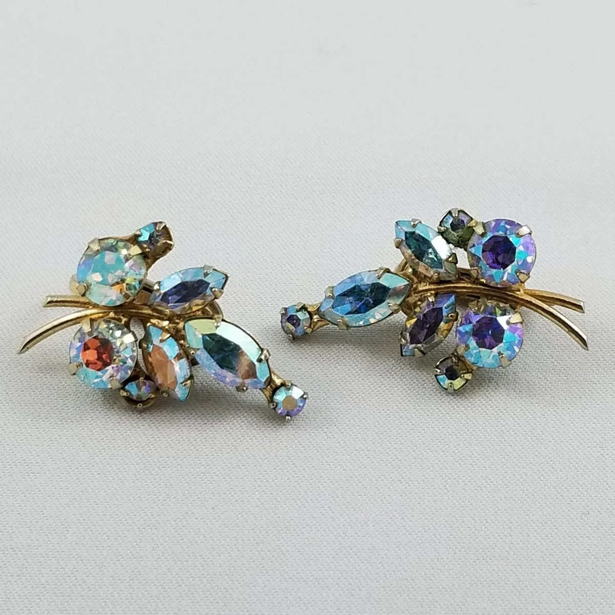 Keyes Aurora Borealis Iridescent Prism Rhinestone Foliate Cluster Clip-on Earrings.jpg