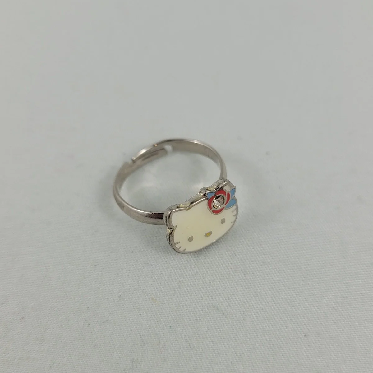 Sanrio 2007 Hello Kitty Enamel Resin Rhinestone Silver-tone Adjustable Ring.jpg