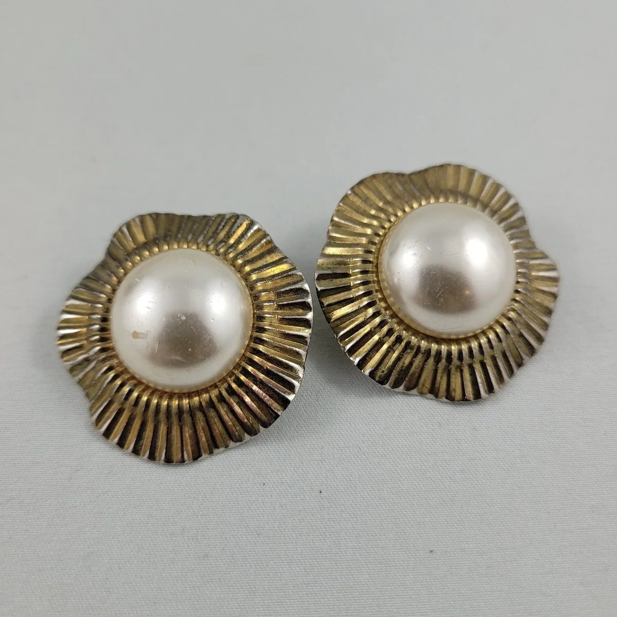 1990's Faux Mabe Pearl Gold Ribbed Waved Metal 1.5 Inch Round Domed Pierced Earrings.jpg