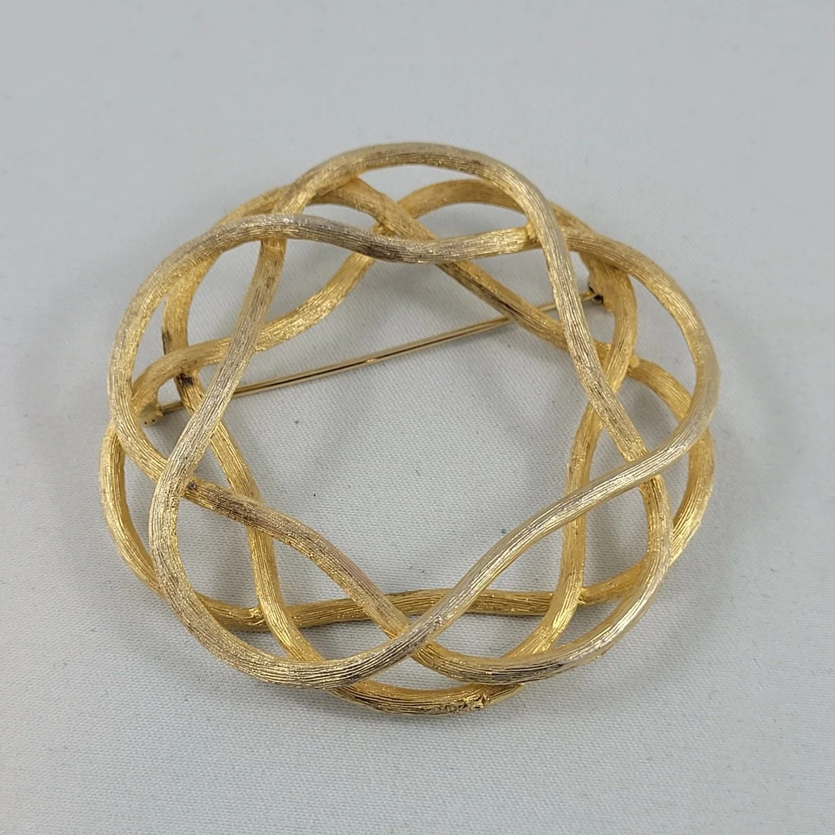 Trifari 1960's Design Florentine Gold Intertwined Woven Bark Free-Flow Rope Four Layered Dimensional 2.5 Inch Wreath Brooch.jpg
