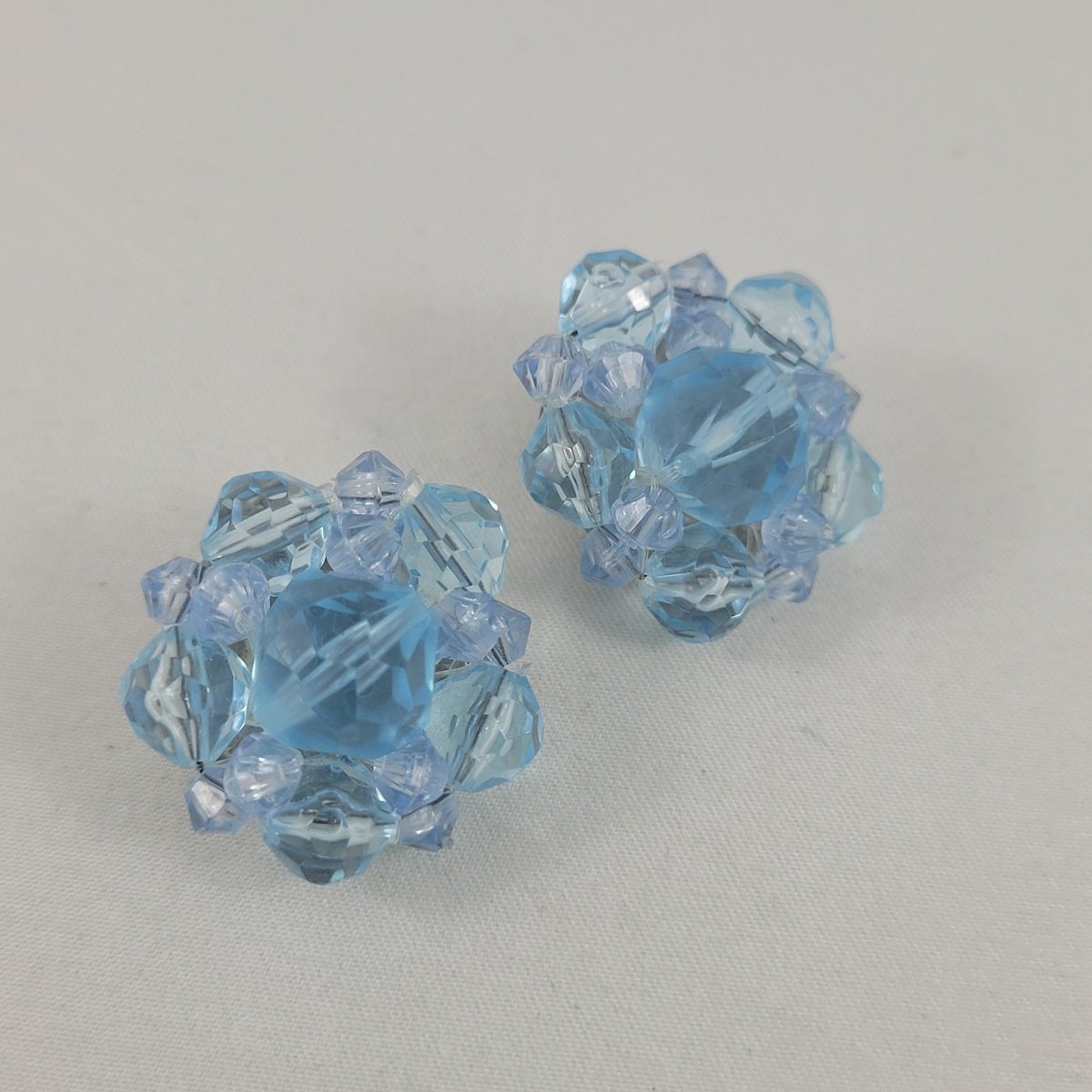 West Germany 1950's Soft Blue Translucent Plastic Bead Cluster Wired 1 Inch Aluminum Clip-on Earrings Side View