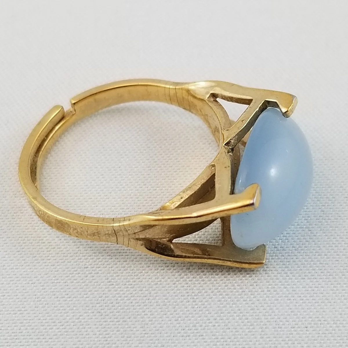 Sarah Coventry 1960’s “Beauty Glow” Blue Glass Moonstone Gold-Tone Ring Adjustable Size.jpg