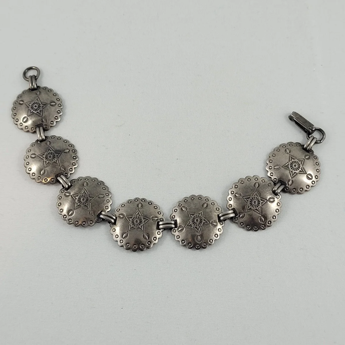 Fred Harvey Era Bell Trading Post Southwestern Navajo Hand Stamped Star Concho Design Nickel Silver Scalloped Panel Link Bracelet