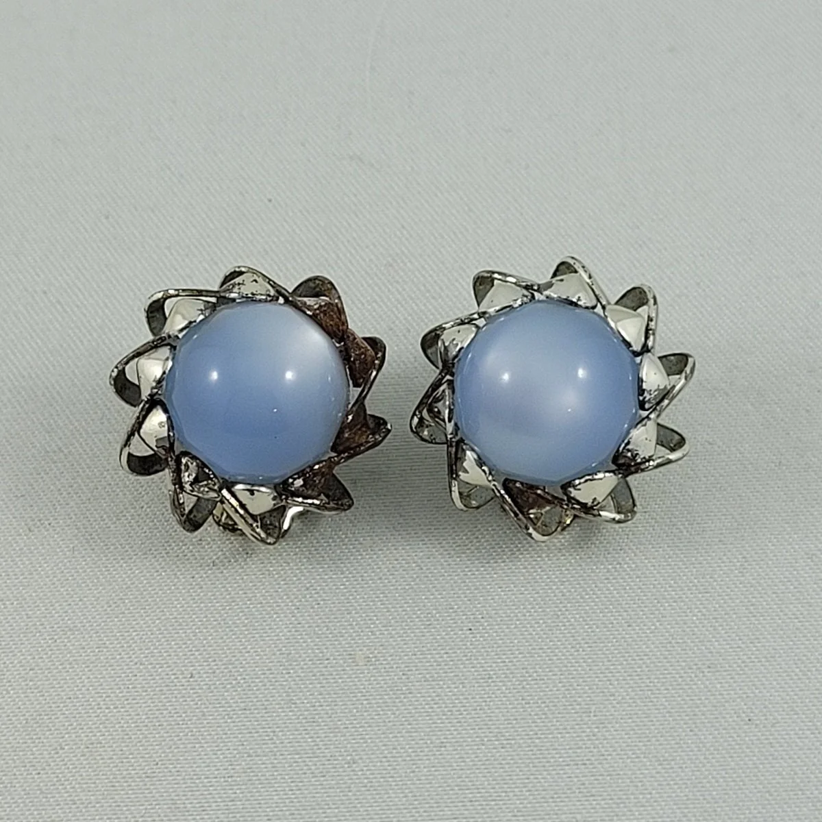 Lisner Silver Plated Vortex Swirl Whirl Blue Moonglow Thermoset Clip-on Earrings