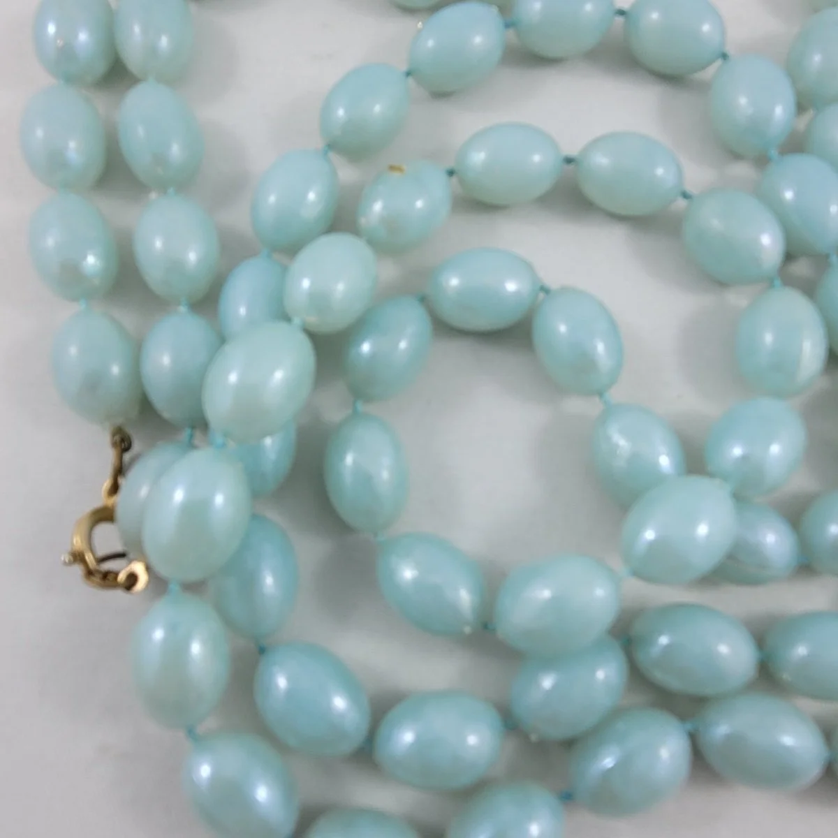 1930's Early Moulded Plastic Robbin Egg Blue Oval Fixed Bead 53.5 Inch Beaded Rope Necklace Close Up