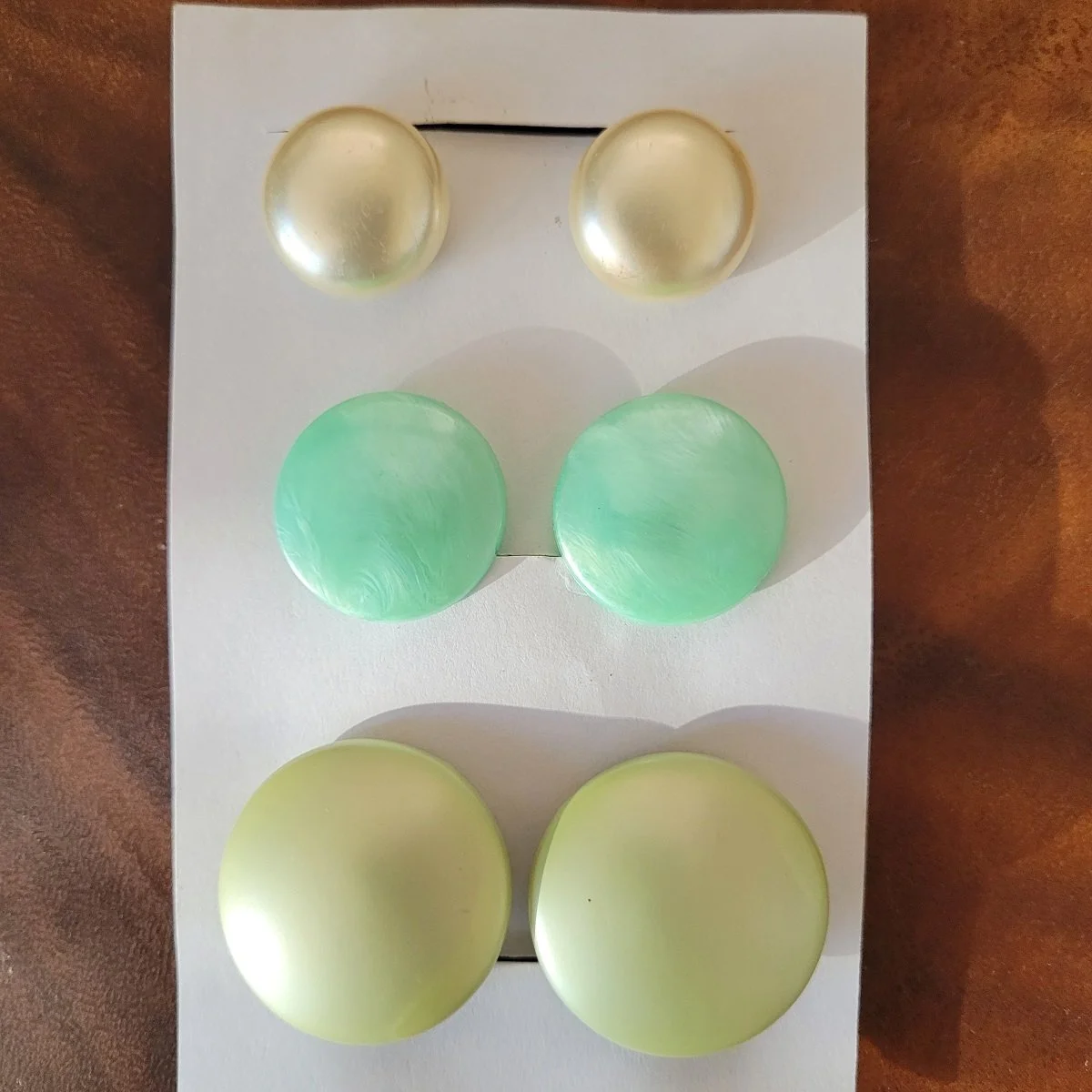 THREE PAIRS - 1960's Pearlized Luminescent Luster Mint Moonglow Lucite Saucer Button Domed Filigree Clip-on Earrings.jpg