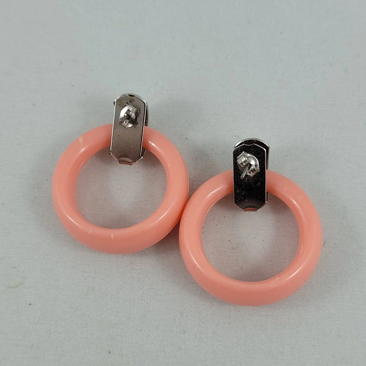 1950's - 1960's Articulated Cotton Candy Pink Early Molded Plastic 1.375 inch Round Hoop Door Knocker Pierced 1.75 Inch Drop Earrings -1.jpg