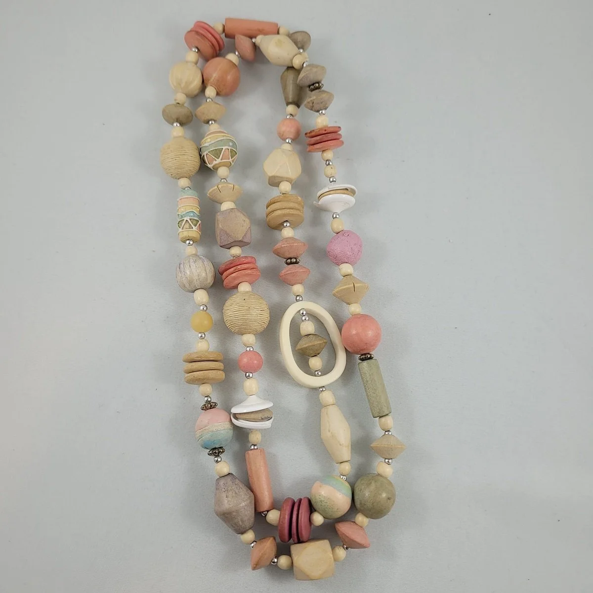 Southwestern Artwear Santa Fe Style Natural Mixed Media Wood Tagua Clay Shell Geometric Pastel Bead Claspless Necklace.jpg