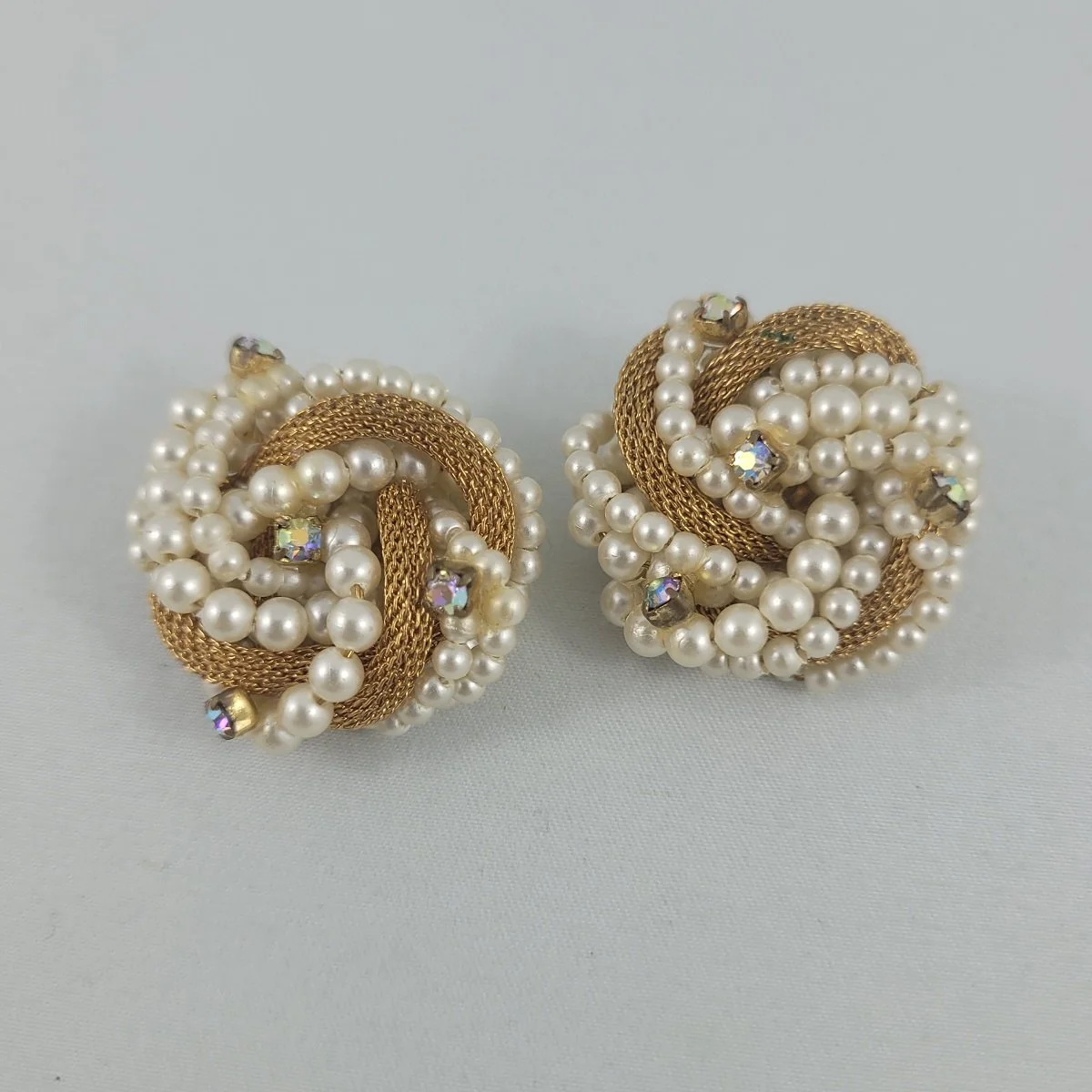1950's - 1960's Gold Tube Mesh Rhinestone Seed Pearl Bead Cluster Knot 1.25 Inch Filigree Clip-on Earrings