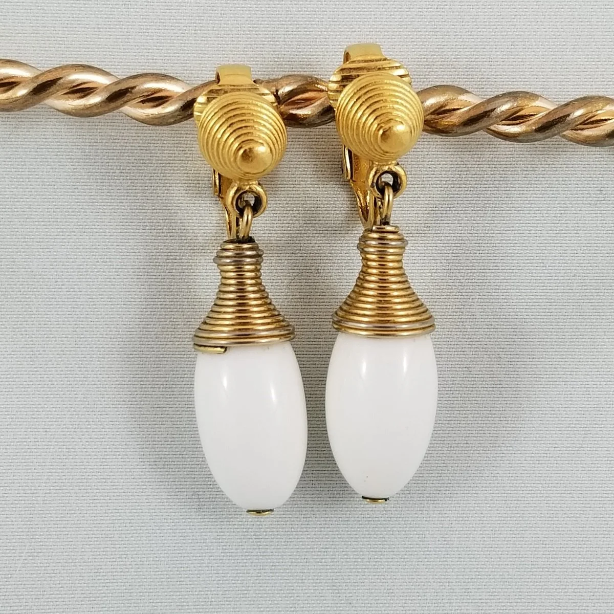 Alfred Philippe Crown Trifari Gold Beehive Coil White Lucite Drop Clip-on Earrings