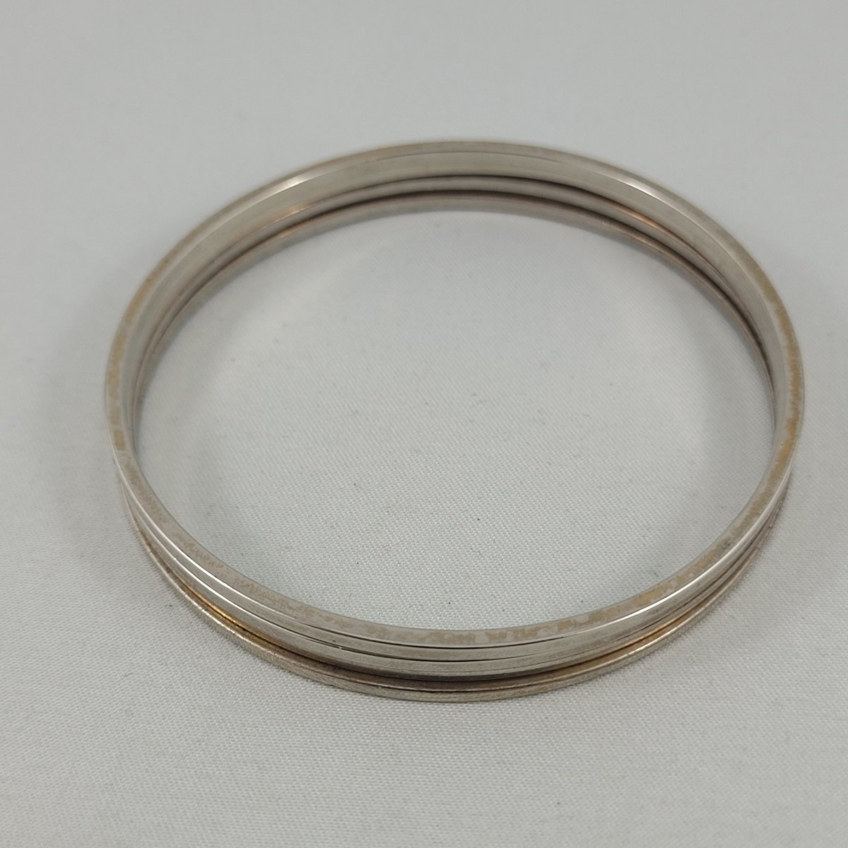 Set of Four Square Tube Silver Brass Spacer Bangle Bracelets Front View