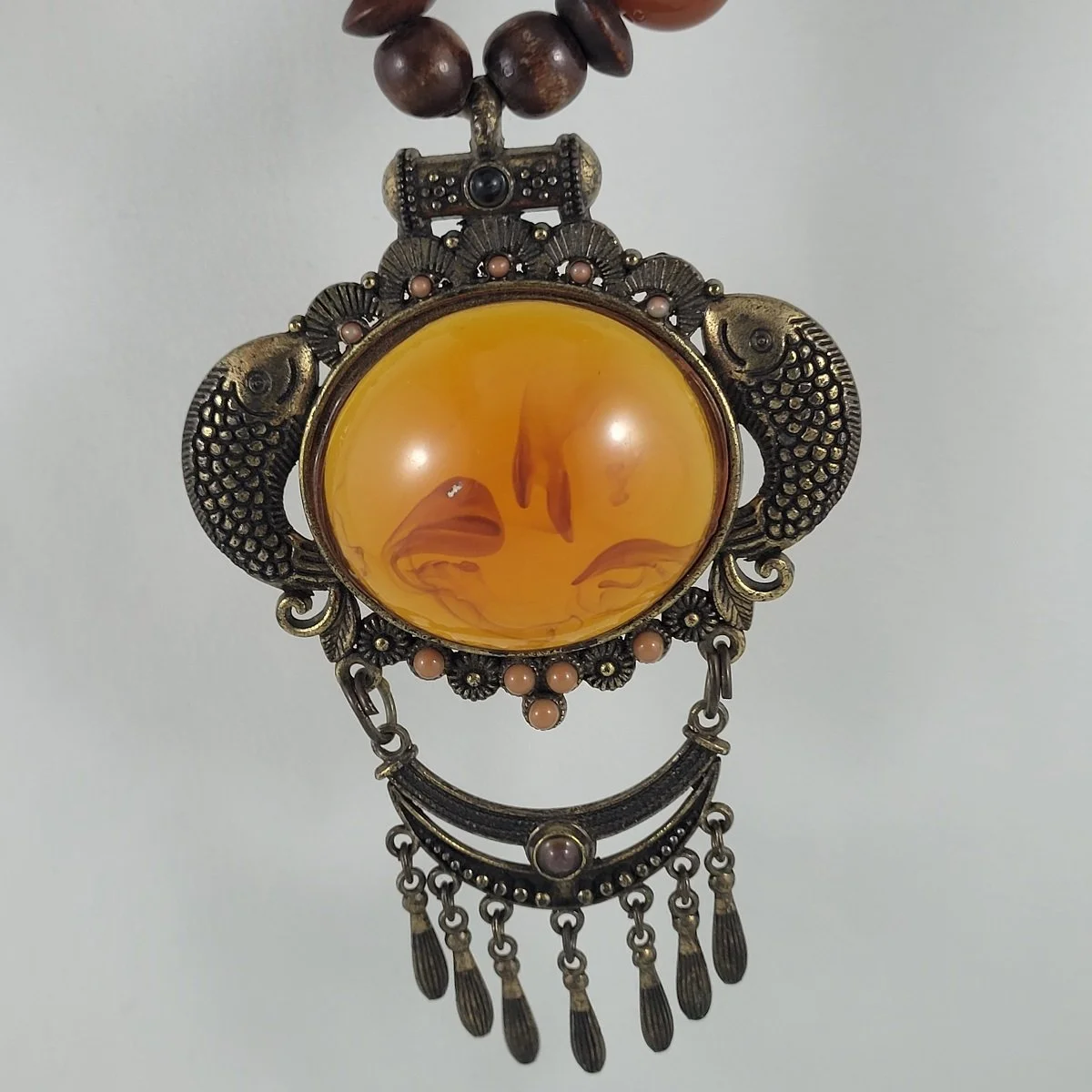 Large Simulated Oval Amber and Wood Bead Double Fish Fringe Fixed Brass Drop Pendant Matinee Statement Necklace Close Up Front