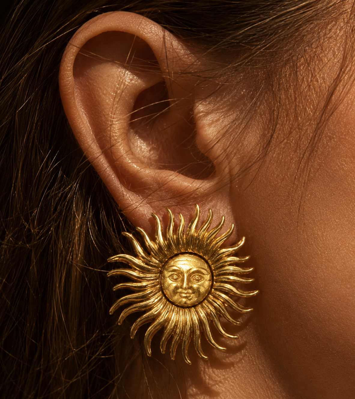 Monet Celestial Sun Face Matte and Polished Gold Sunburst Pierced Earrings -MODEL1.png