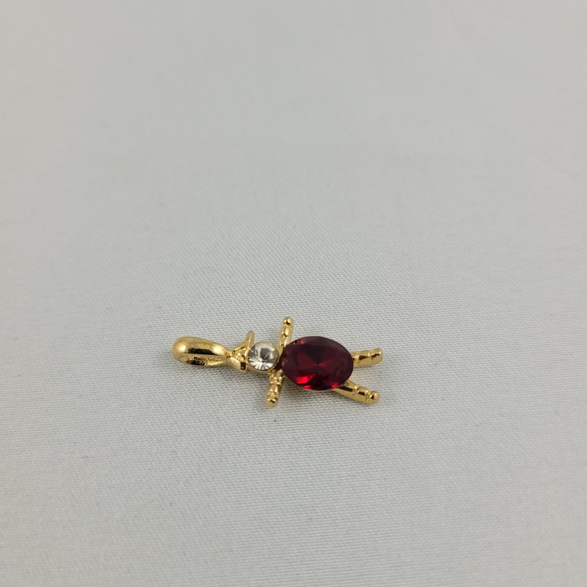 Red Gem Belly Faceted Clear Glass Chaton and Oval Rhinestone Gold-tone Figural Person 1 Inch Charm Pendant Side View