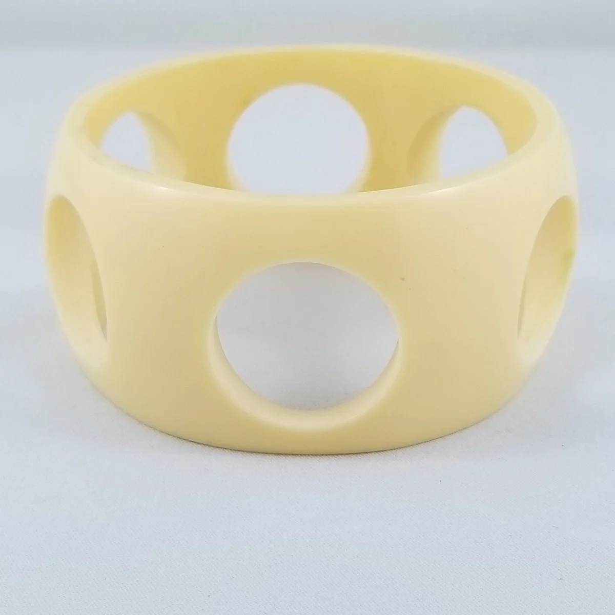 Space Age 1960's Swiss Cheese Creamed Corn Luxe Resin Perforated Wide Domed Bangle Bracelet -4.jpg