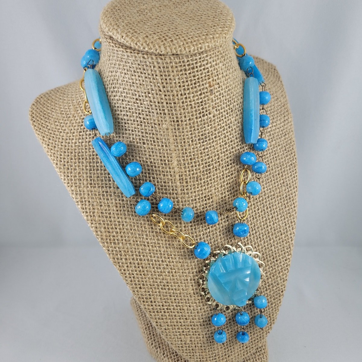 Boho 1970's Mexican Mayan Aztec Tribal Carved Warrior Mask Blue Agate Stone Gold Filigree Pendant Tubular Round Bead Wire Necklace Front