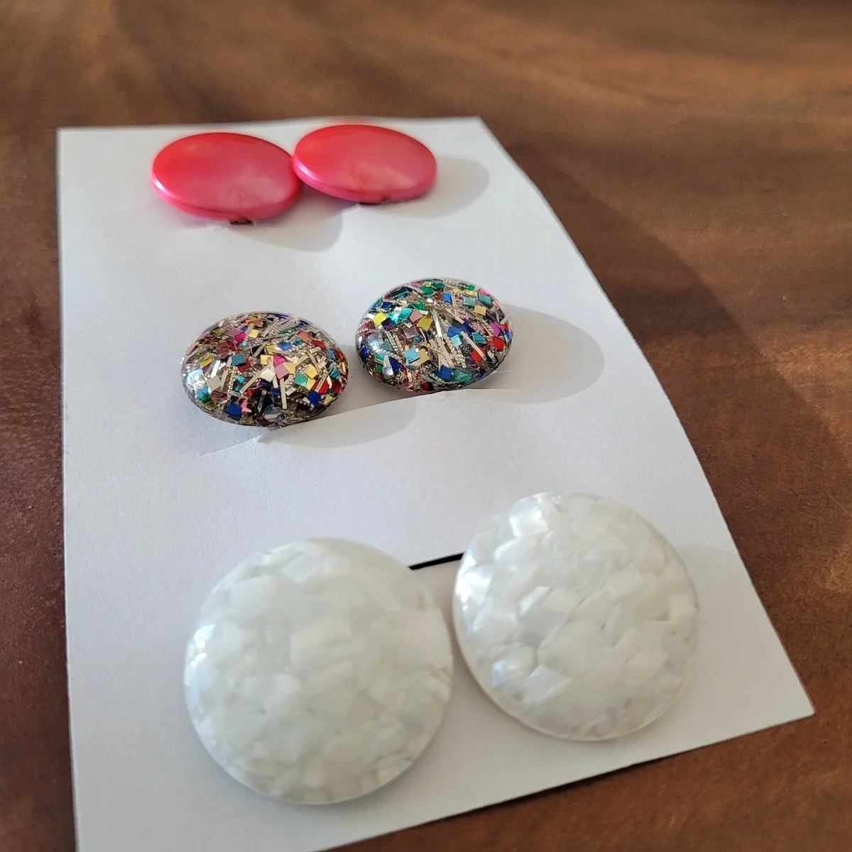 THREE PAIRS - 1960's Clear Lucite Injected Confetti Laminated Plastic Mosaic and Pink Cotton Candy Flat Saucer Round Clip-on Earrings - Side View