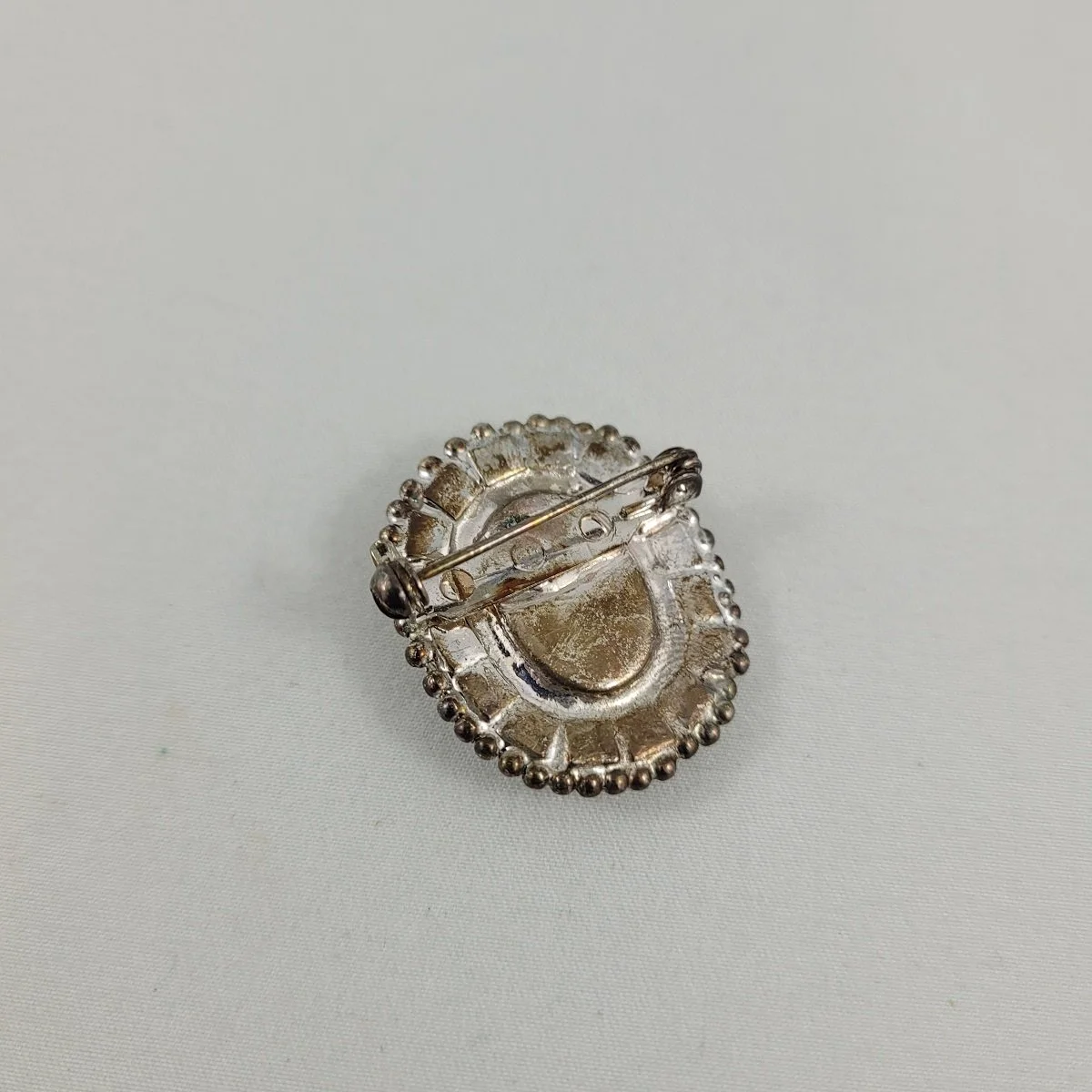 1930's Pot Metal Prong Set Clear Cabochon Chaton Pave Rhinestone 1.25 Inch Oval Brooch Backside