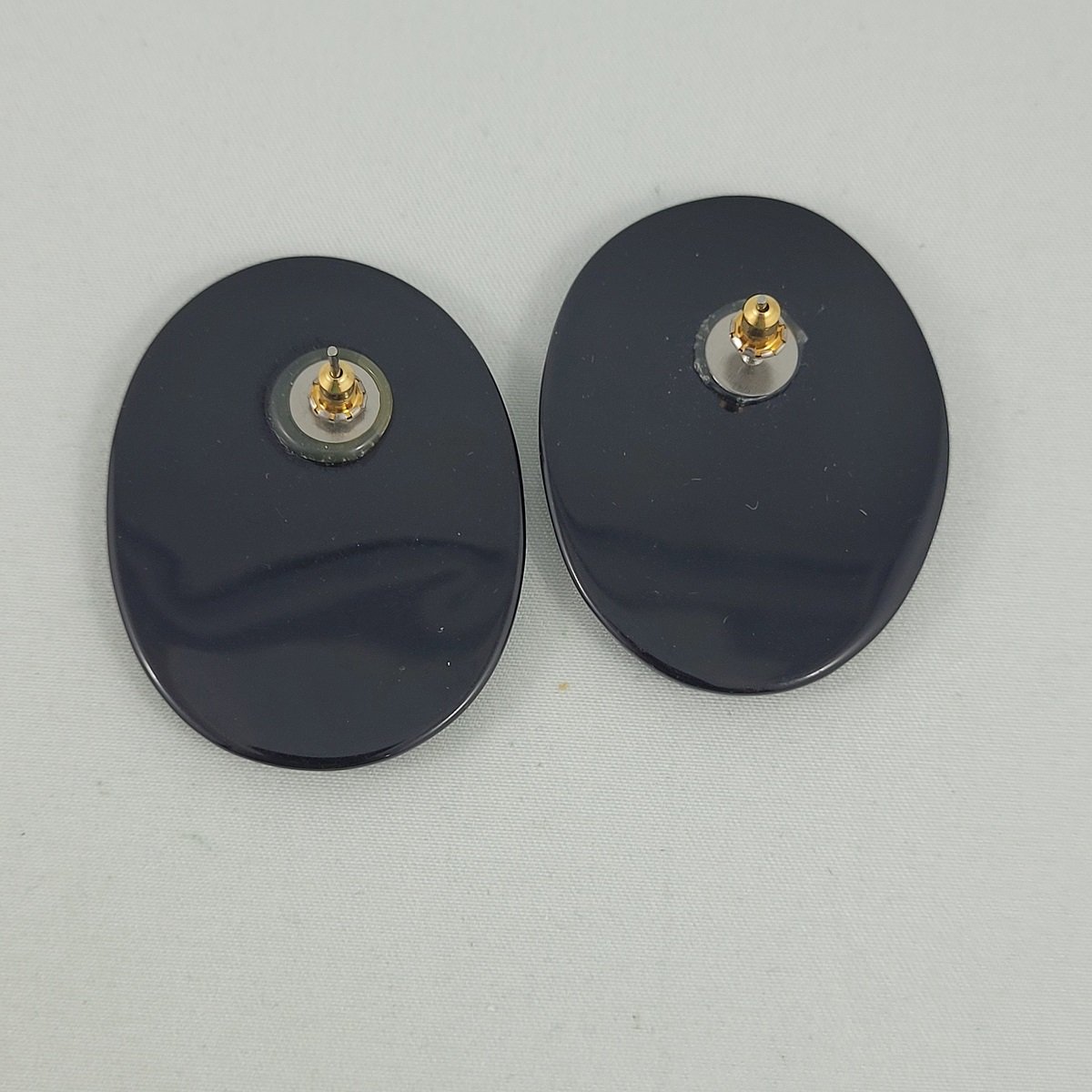 1980's Colour Block Black Yellow and White Laminated Lucite 1.75 Inch Oval Pierced Earrings Backside
