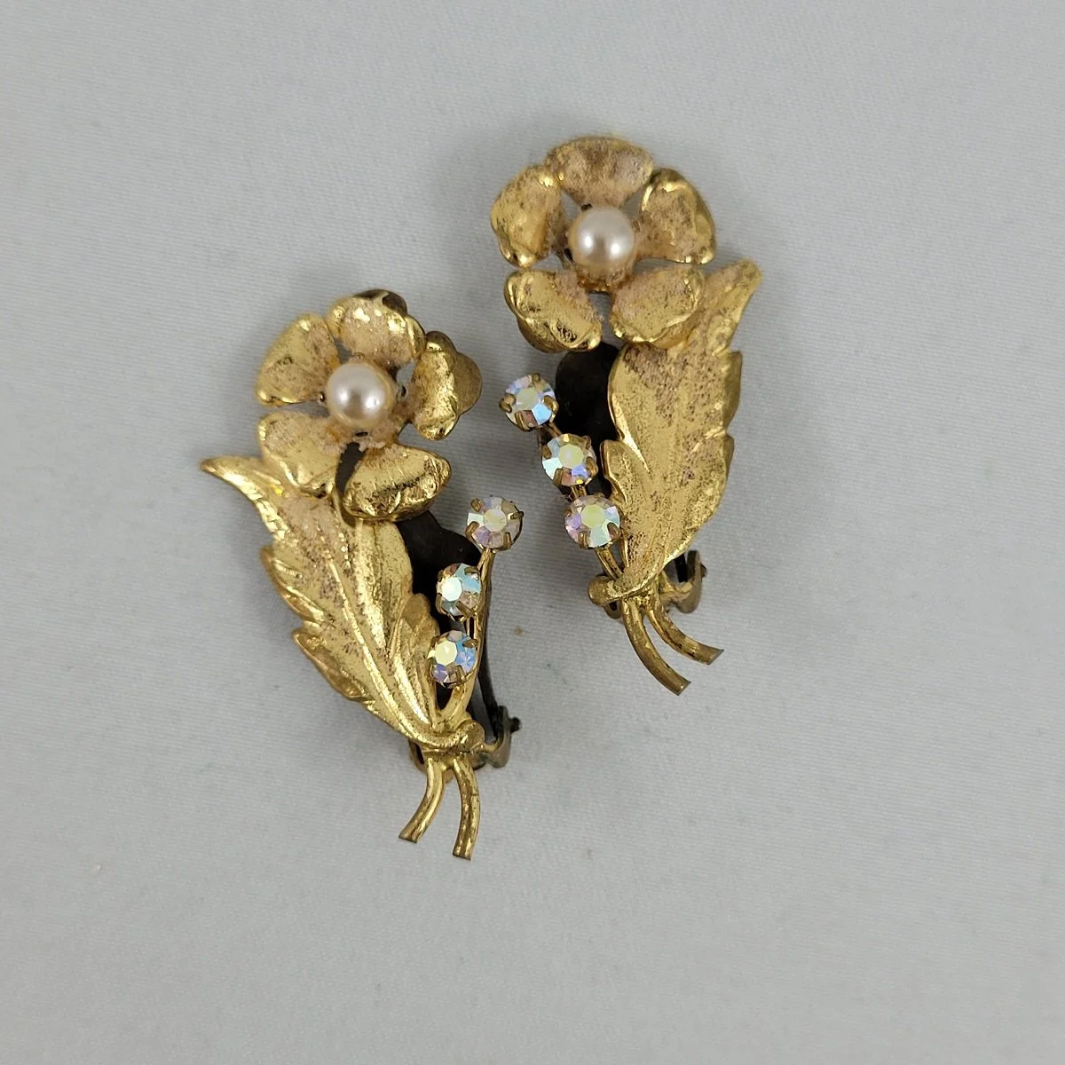 1955 - 1960's Aurora Borealis Rhinestone Faux Pearl Leaf Flower Spray Textured Brass 1.5 Inch Clip-on Climber Earrings