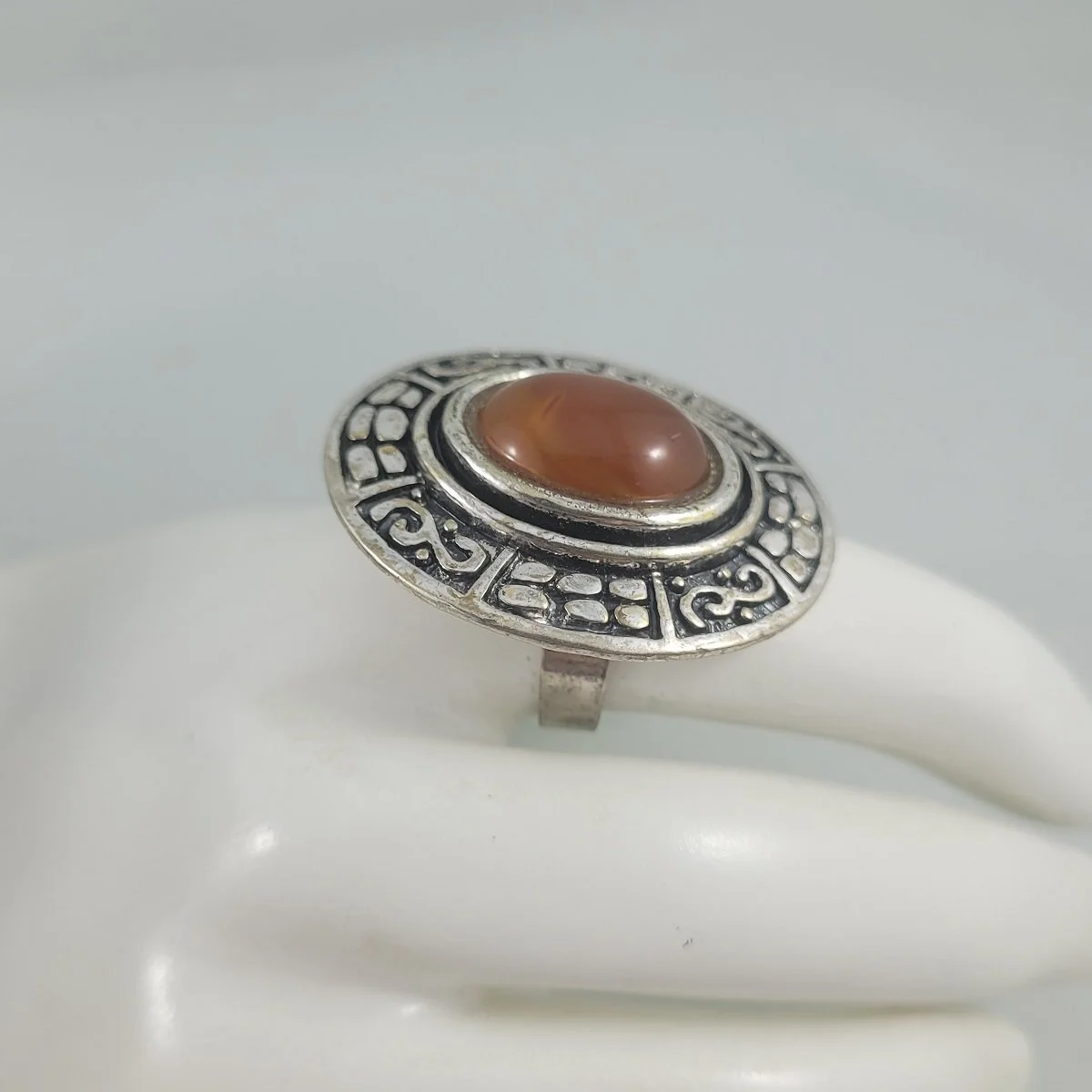 Native American or Aztec Style 1.5 Inch Oval Carnelian Gemstone Cabochon Open Back Adjustable Silver Plate Brass Ring Side View
