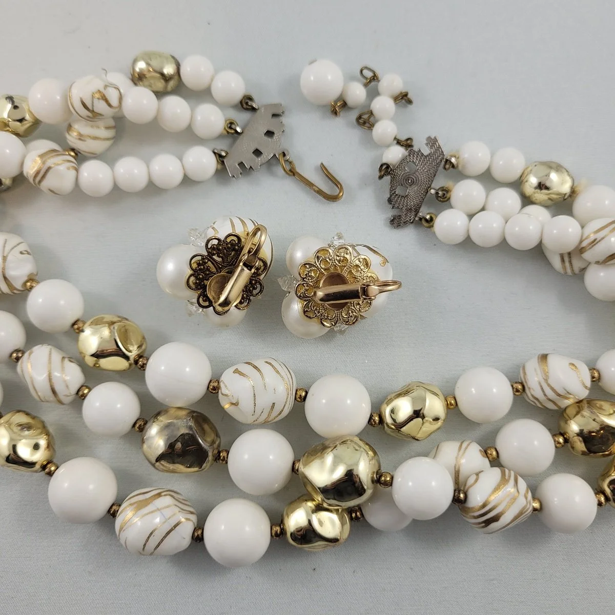 1950's Splatter Paint Scribble Art White Gold Dimpled Nugget Plastic Lucite Bead Triple Strand Necklace Matching Wired Cluster Bead Clip Earrings Set -2.jpg