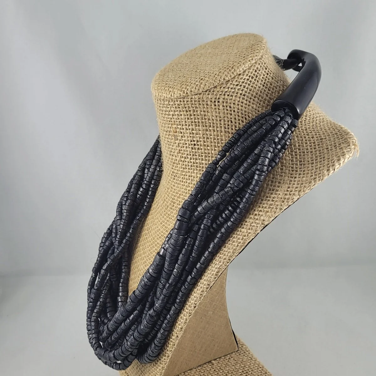 Gerda Lynggaard Style Monies Copenhagen Simulated Carved Horn Shimmering Charcoal Coconut Bead 10 Strand Avant-Garde Torsade Necklace Left Side View