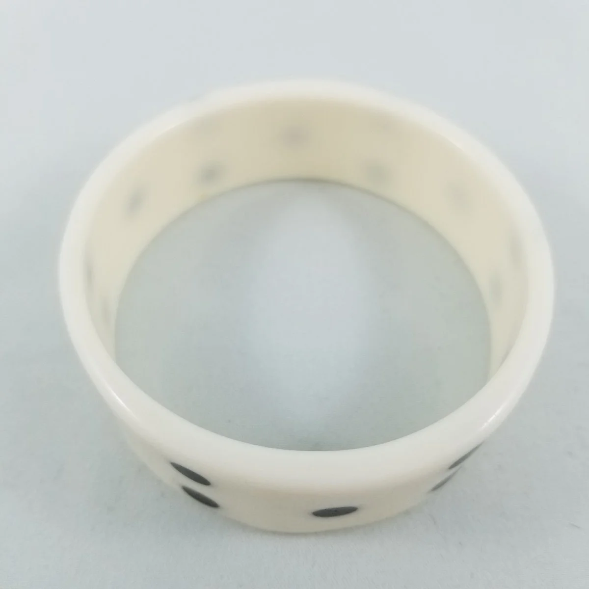 Mod 1960's Injected Polka Dot White Lucite Bangle Bracelet.jpg