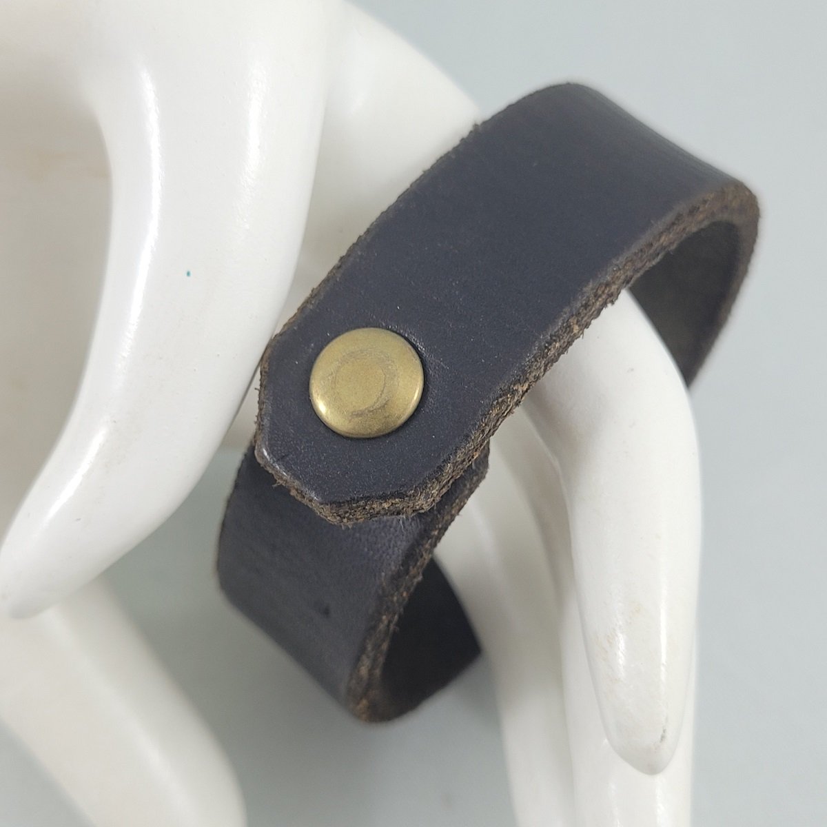 Personalized Name 'BREA' Impressed .75 Inch Brown Leather Strap Snap 7.5 Inch Bracelet Close up