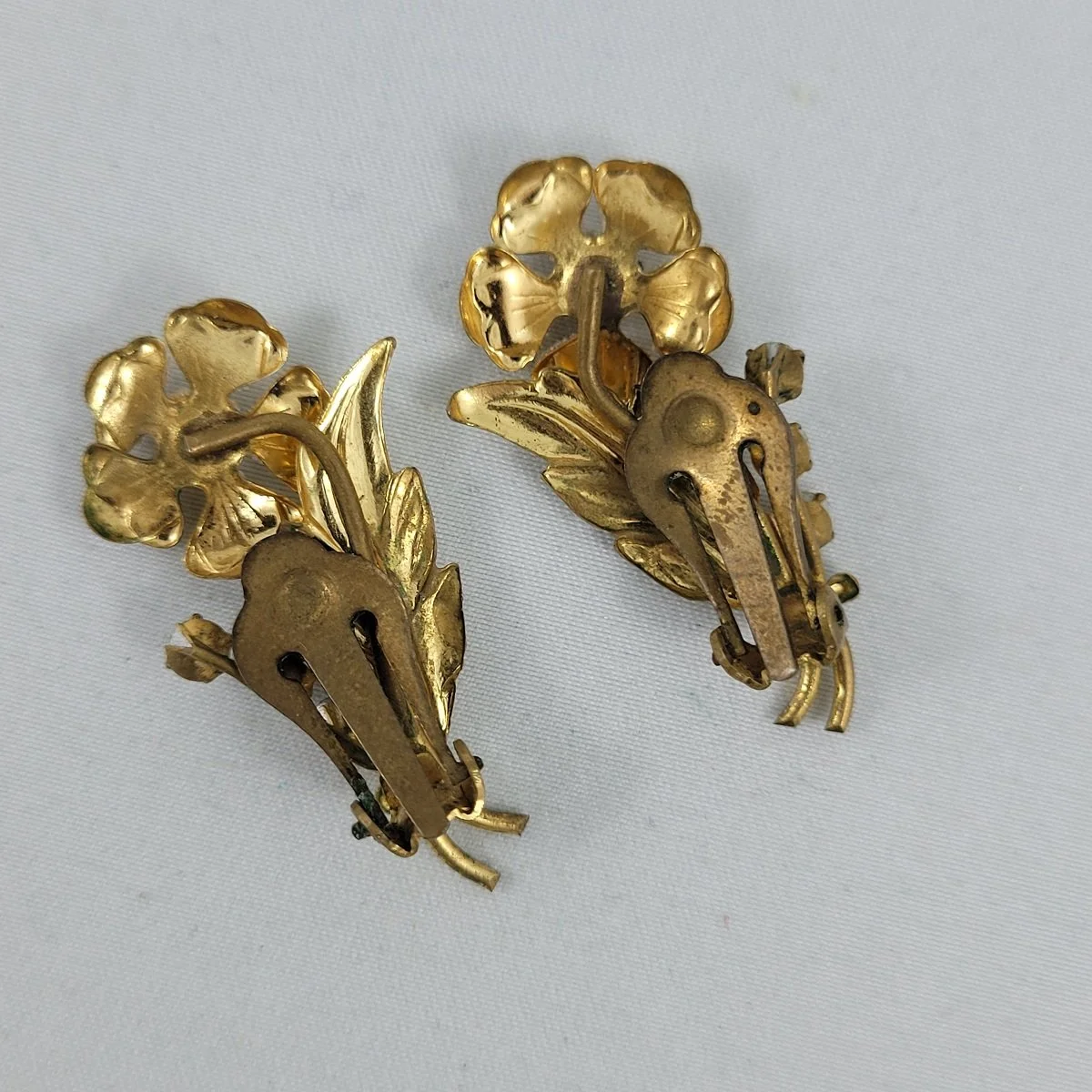 1955 - 1960's Aurora Borealis Rhinestone Faux Pearl Leaf Flower Spray Textured Brass 1.5 Inch Clip-on Climber Earrings Backside