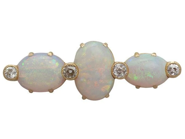 antique-victorian-874-ct-opal-and-096-ct-diamond-18-ct-yellow-gold-brooch.jpg