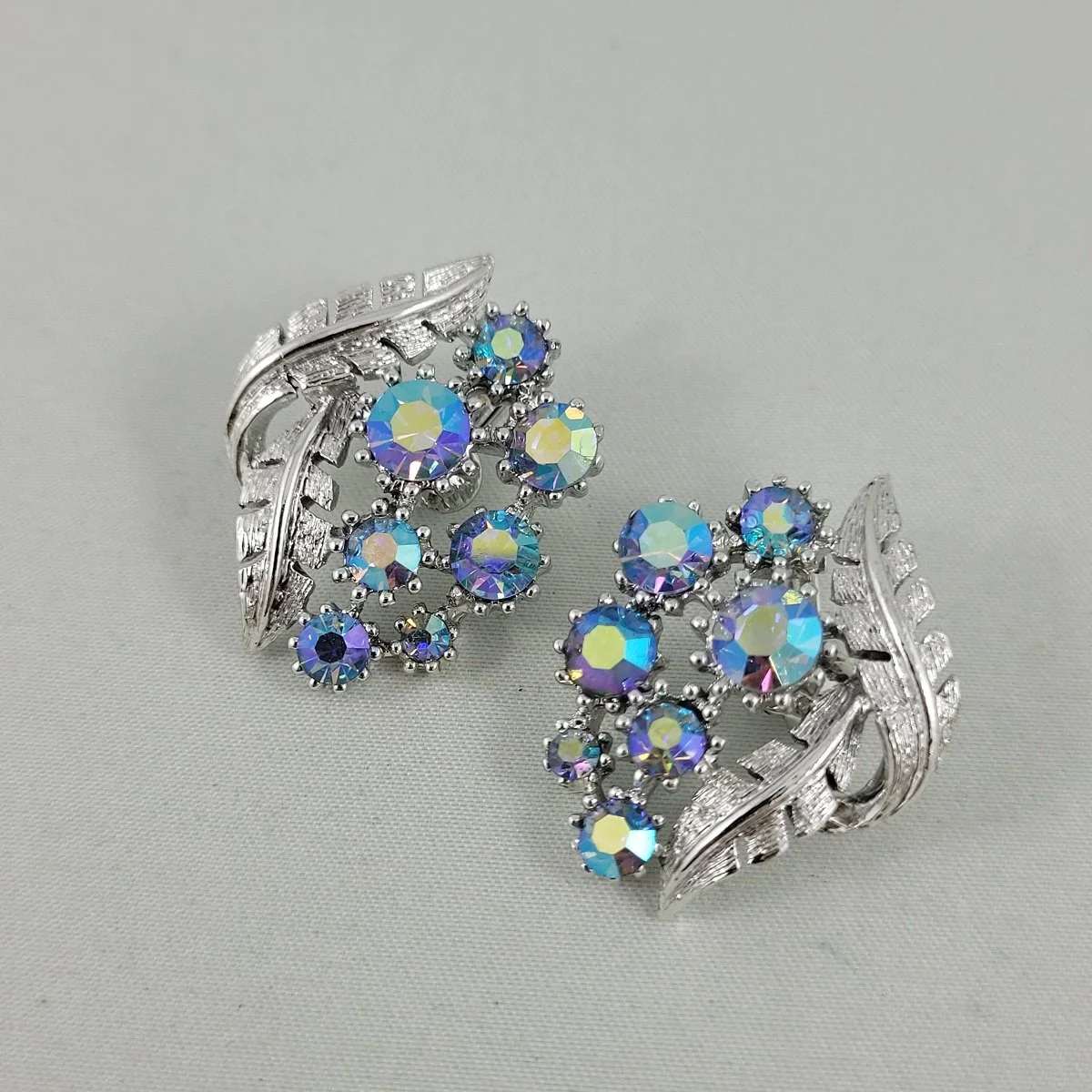 Coro Attributed Mid-Century Blue Aurora Borealis Rhodium Plated Floral Spray Clip-on Earrings -1.jpg