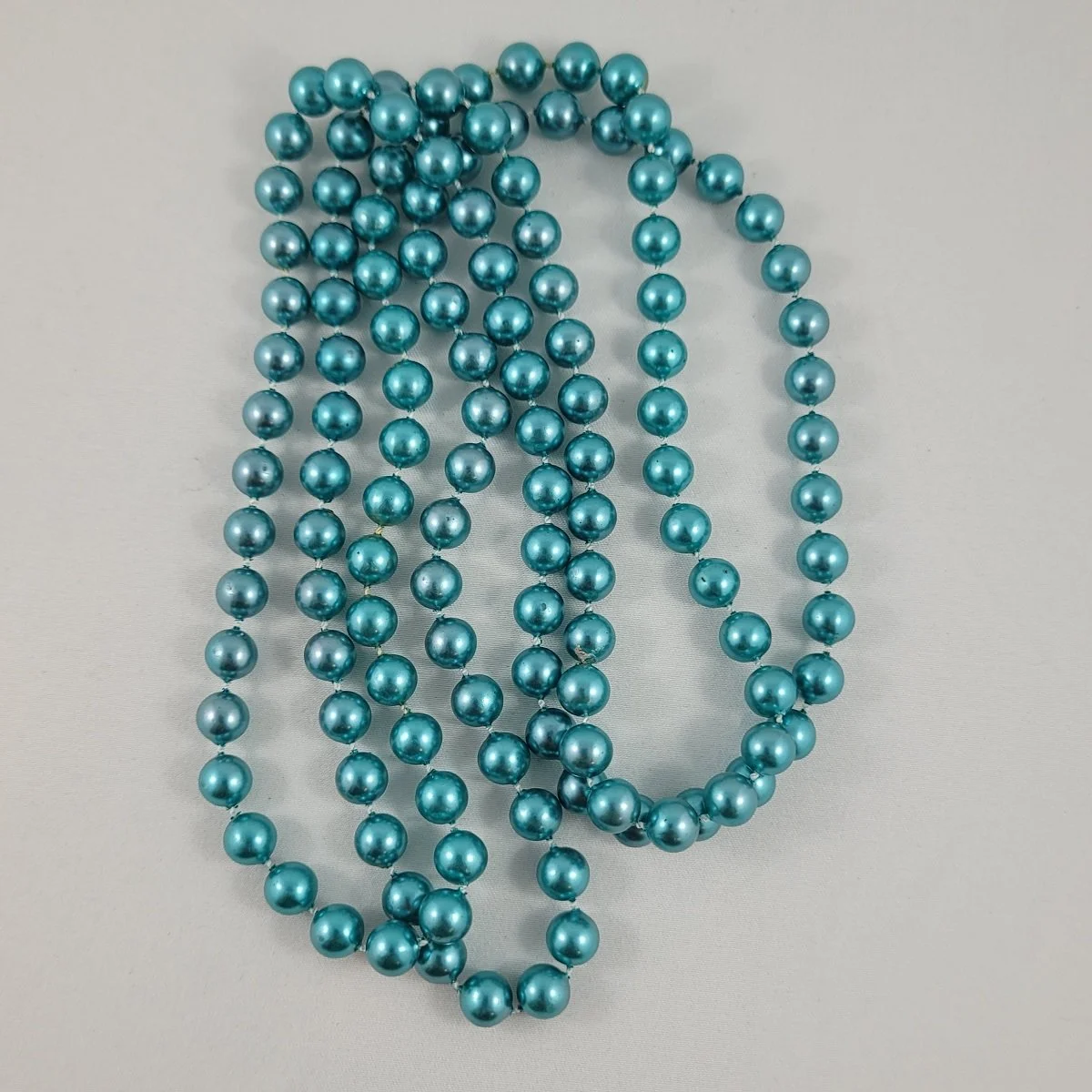 Metallic Aqua Faux Pearl Fixed 8mm Bead 47 Inch Rope Necklace.jpg