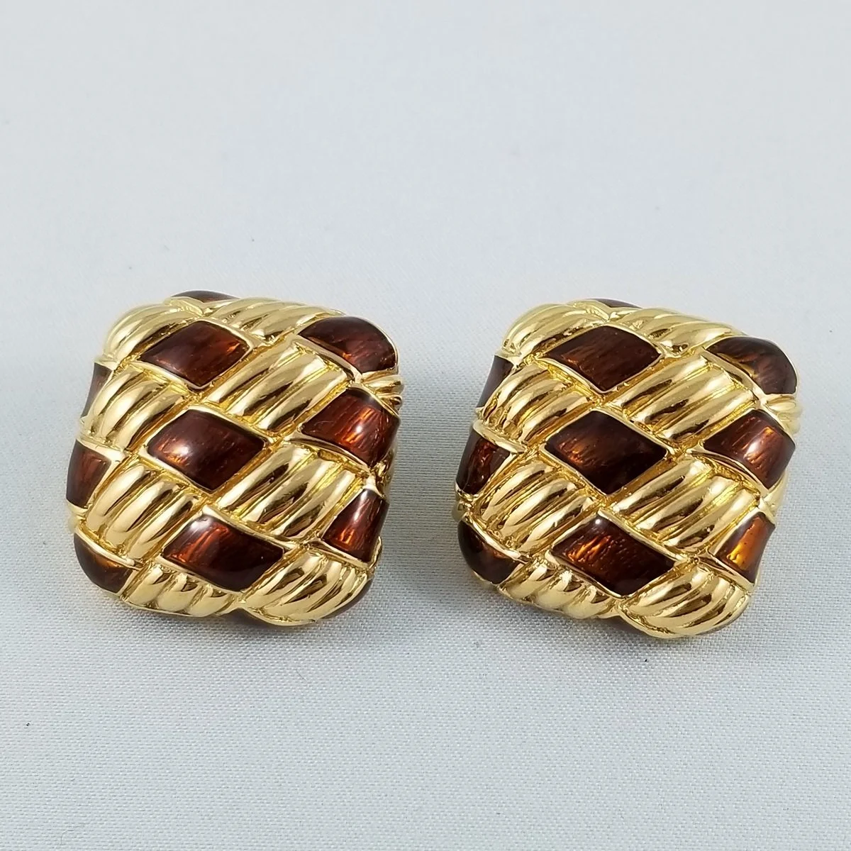 Ciner Burnt Orange Enamel Ribbed Basketweave Gold Clip-on Earrings.jpg