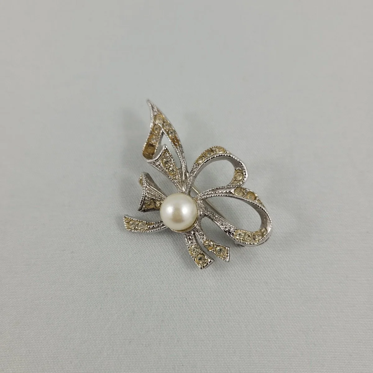 1940's - 1950's Ribbon Bow Pave Clear Rhinestone Faux Marcasite Pearl Silver-tone 1.5 Inch Brooch