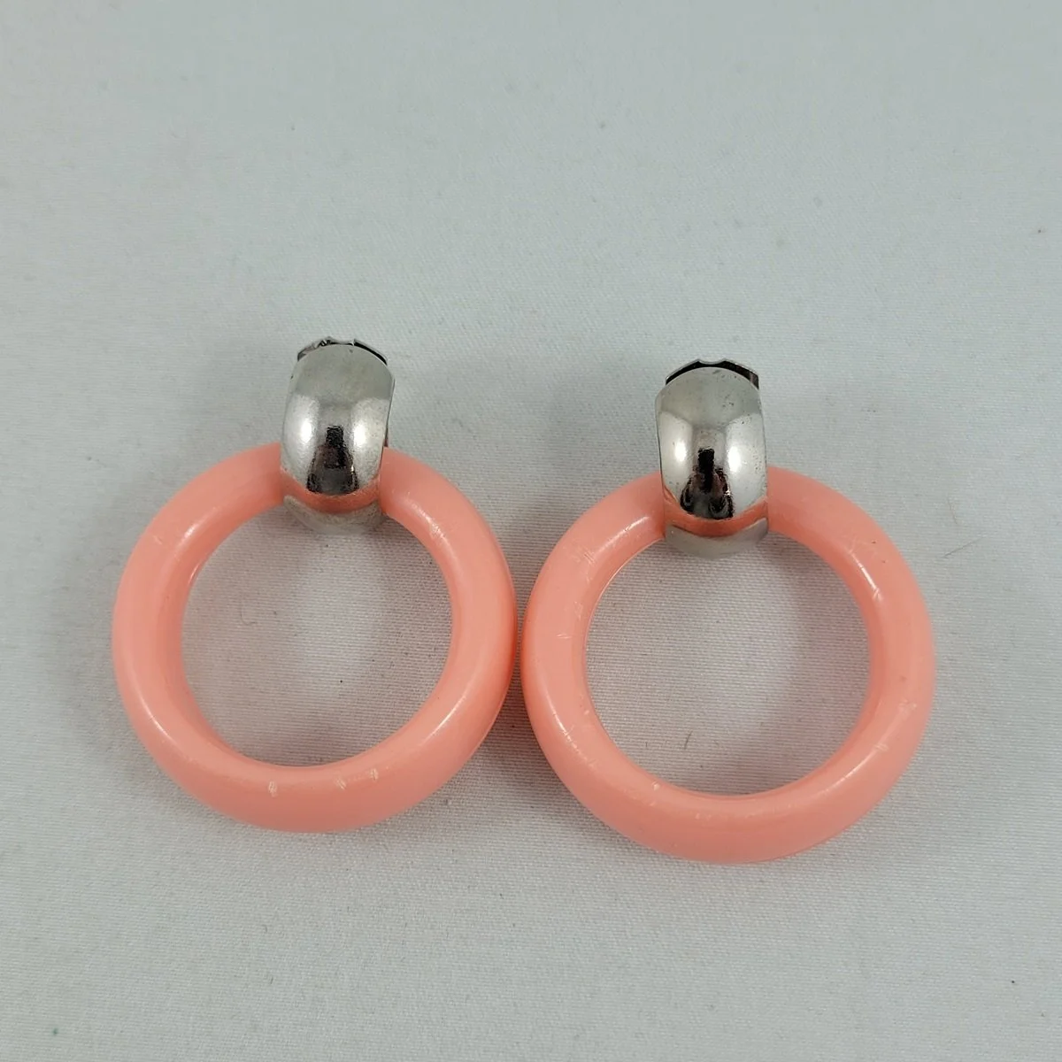 1950's - 1960's Articulated Cotton Candy Pink Early Molded Plastic 1.375 inch Round Hoop Door Knocker Pierced 1.75 Inch Drop Earrings.jpg