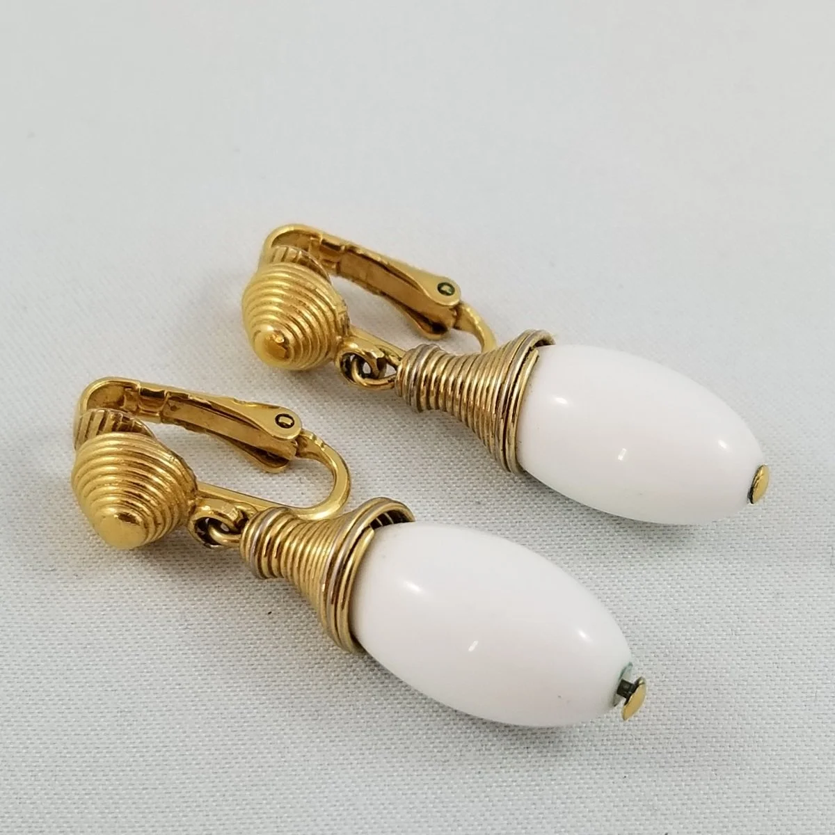 Alfred Philippe Crown Trifari Gold Beehive Coil White Lucite Drop Clip-on Earrings.jpg