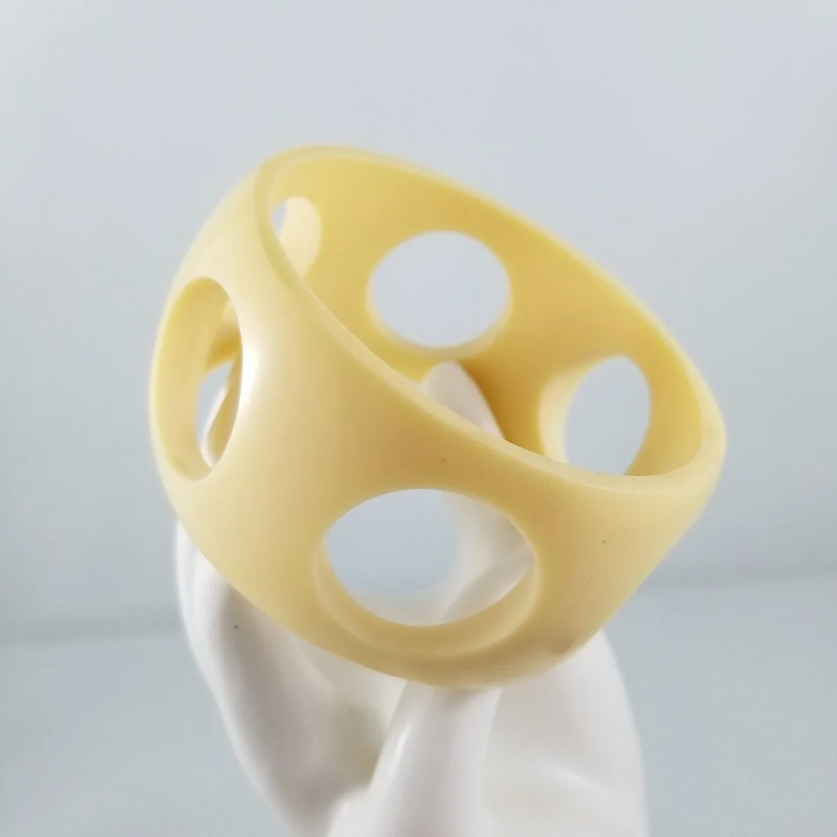 Space Age 1960's Swiss Cheese Creamed Corn Luxe Resin Perforated Wide Domed Bangle Bracelet -2.jpg